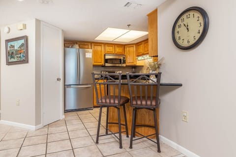 Condo, 2 Bedrooms | Private kitchen | Fridge, oven, coffee/tea maker