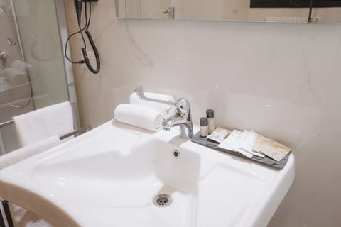 Classic Room | Bathroom | Hair dryer, bathrobes, slippers, towels