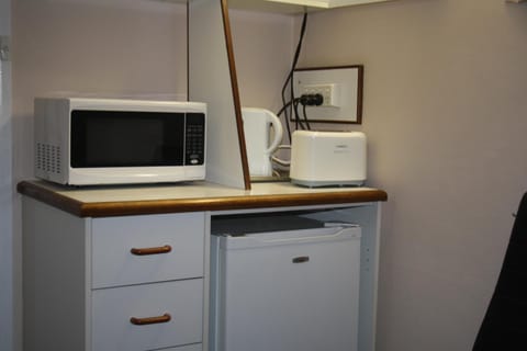 Fridge, microwave, coffee/tea maker, electric kettle