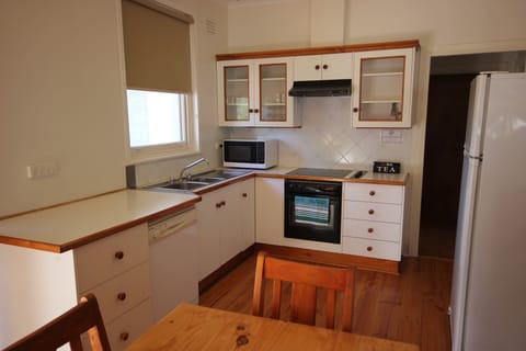 Family Apartment, 2 Bedrooms, Private Bathroom | Private kitchen | Fridge, microwave, coffee/tea maker, electric kettle