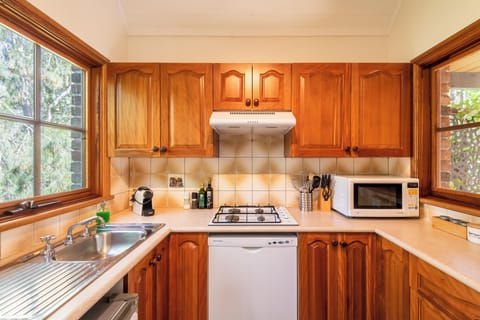 Husky Beach Cottage | Private kitchen | Fridge, microwave, espresso maker, coffee/tea maker