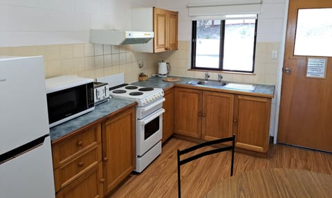 Classic Villa | Private kitchen | Full-size fridge, microwave, stovetop, coffee/tea maker