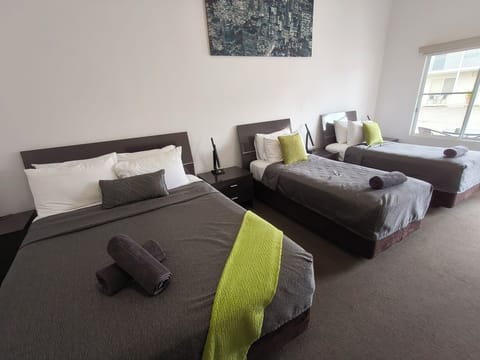 Standard Studio, Non Smoking (Queen and two singles) | Pillowtop beds, iron/ironing board, free WiFi, bed sheets