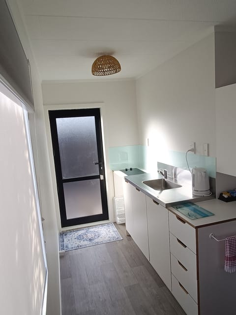 One Bedroom Triple Unit | Private kitchen | Fridge, microwave, coffee/tea maker, electric kettle