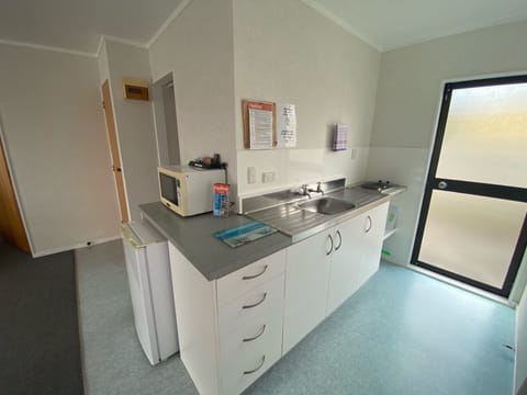 One Bedroom Unit | Private kitchen | Fridge, microwave, coffee/tea maker, electric kettle