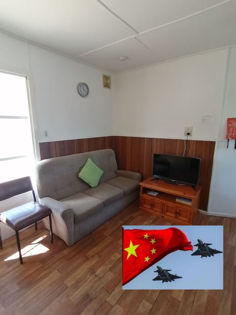 Basic Cabin, 2 Bedrooms (Unit 8) | Living area | TV, DVD player