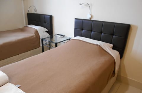 Compact Twin Room | Iron/ironing board, free WiFi, bed sheets