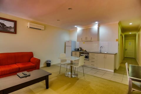 Standard Suite, 1 Bedroom, Kitchen (Apartment) | Living room | 39-inch flat-screen TV with cable channels, TV