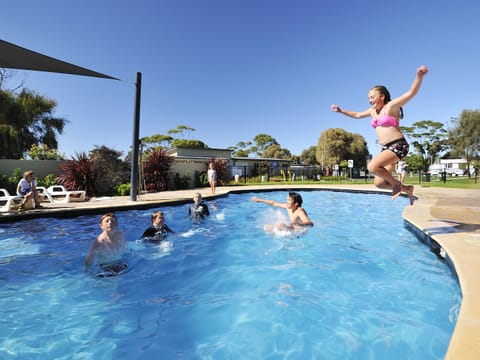 Outdoor pool, pool umbrellas, sun loungers