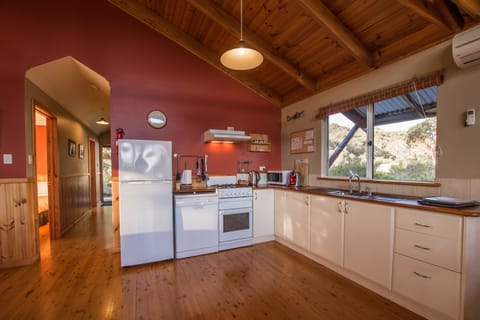 Deluxe Cottage, 2 Bedrooms, Hill View | Private kitchen | Full-size fridge, microwave, oven, stovetop