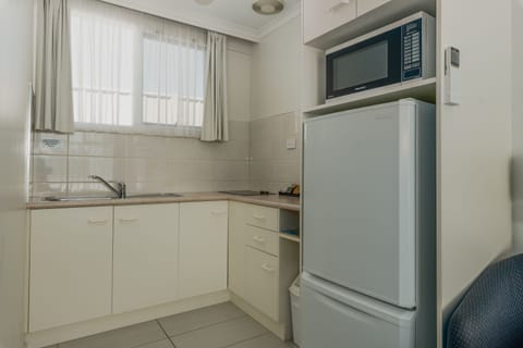 Family Apartment | Private kitchen | Microwave, coffee/tea maker, toaster