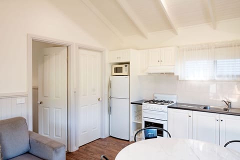 Deluxe Cabin, 1 Bedroom | Living area | LCD TV, DVD player