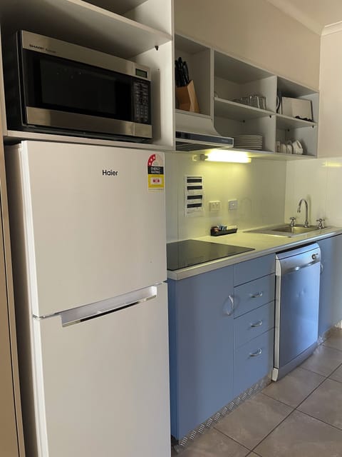 Full-size fridge, microwave, stovetop, coffee/tea maker