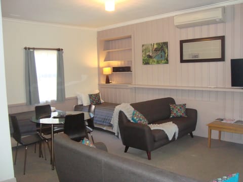 Standard Suite, 1 Bedroom, Non Smoking, Kitchenette (Unit 5 Spa) | Living area | TV, DVD player