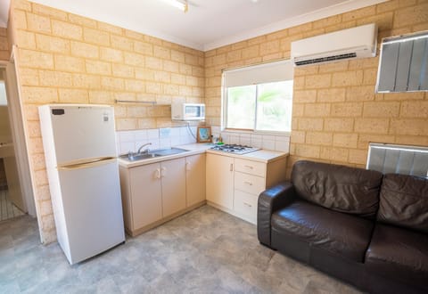 Chalet, 1 Bedroom | Private kitchen | Fridge, electric kettle, toaster, highchair