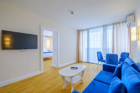 Deluxe Suite, Sea View | Living room | LCD TV