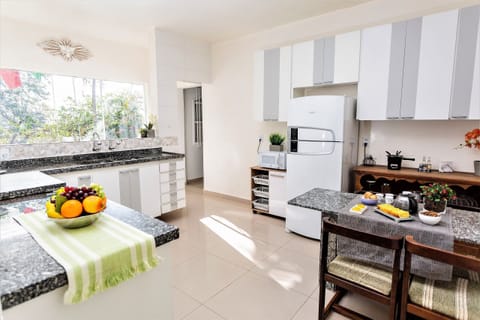 Villa | Private kitchen | Fridge, microwave, oven, stovetop