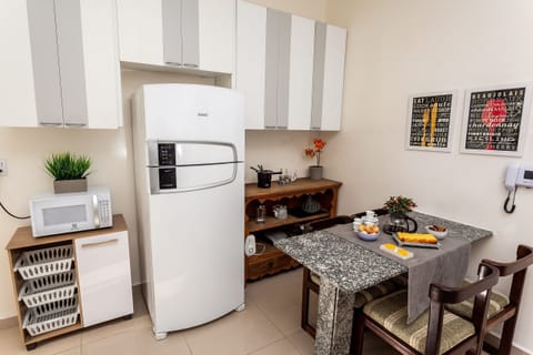 Villa | Private kitchen | Fridge, microwave, oven, stovetop