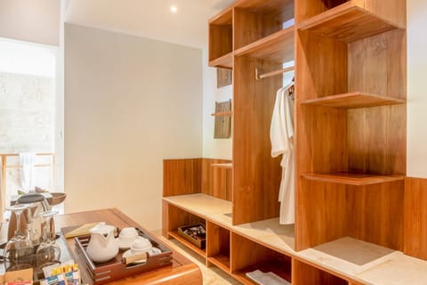 Designer toiletries, hair dryer, bathrobes, slippers