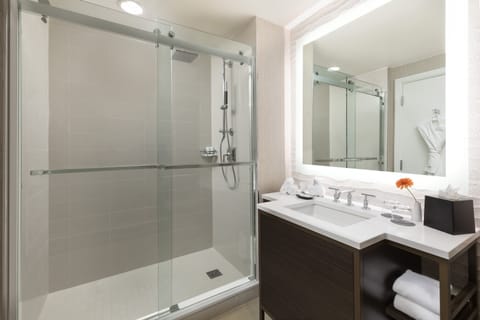 Combined shower/tub, designer toiletries, hair dryer, bathrobes