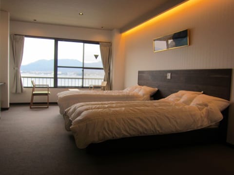 Deluxe Twin Room, Non Smoking, Sea View | Down comforters, desk, free WiFi, bed sheets