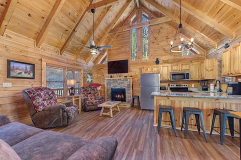 Cabin, Multiple Beds, Hot Tub, Garden View | Living area | TV, fireplace