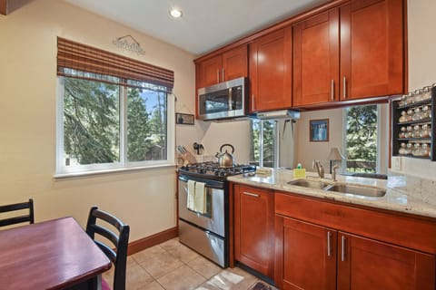 Condo, Multiple Beds, Balcony | Private kitchen | Fridge, microwave, oven, stovetop