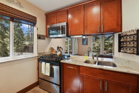 Condo, Multiple Beds, Balcony | Private kitchen | Fridge, microwave, oven, stovetop