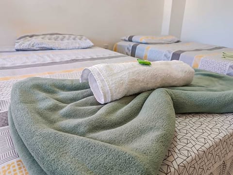 Economy Twin Room | Minibar, individually decorated, desk, laptop workspace