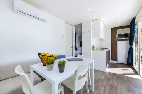 Comfort Mobile Home, Terrace | Private kitchen | Fridge, microwave, stovetop, coffee/tea maker