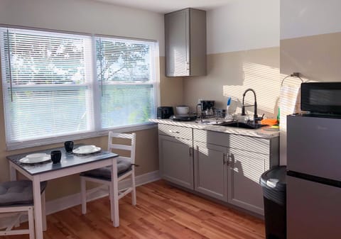 Apartment (2 Room, Lake View, Work Desk) | Private kitchen | Mini-fridge, microwave, stovetop, coffee/tea maker