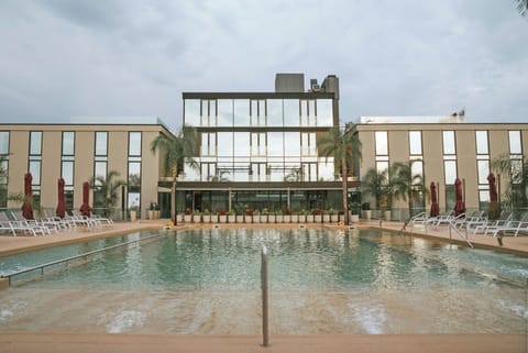 Outdoor pool, pool umbrellas, sun loungers