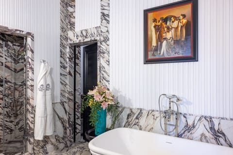 Executive Suite | Bathroom | Designer toiletries, hair dryer, bathrobes, slippers