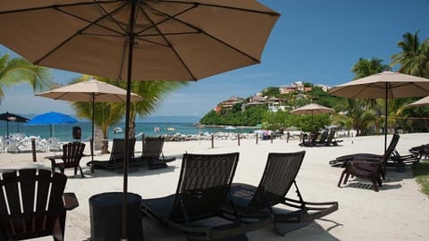 Private beach, sun loungers, beach umbrellas, beach towels