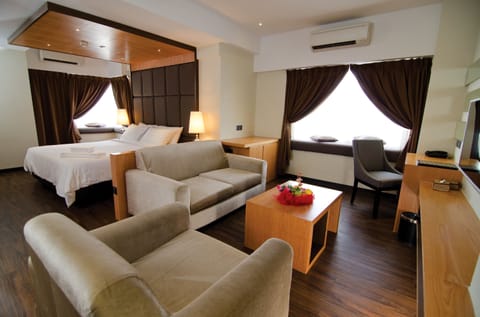 Suite, 1 King Bed | Living area | 32-inch flat-screen TV with premium channels, TV