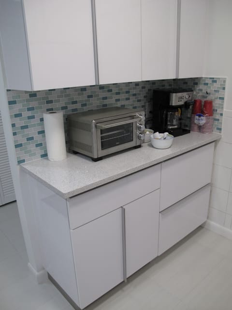 Standard Suite, 1 King Bed | Private kitchen | Full-size fridge, microwave, stovetop, dishwasher