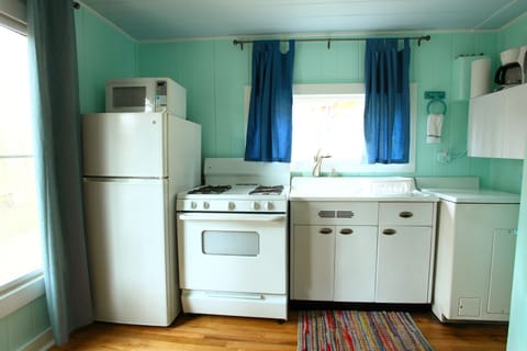 Cottage Four | Private kitchen | Full-size fridge, microwave, oven, stovetop