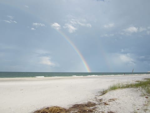 Beach nearby, white sand, sun loungers, beach umbrellas