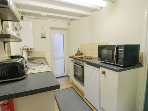 Fridge, electric kettle, toaster, cookware/dishes/utensils