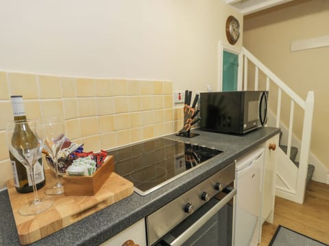 Fridge, electric kettle, toaster, cookware/dishes/utensils