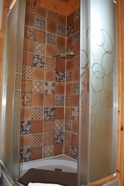 Shower, rainfall showerhead, towels, soap