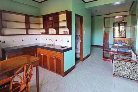 Triple Room | Private kitchenette | Mini-fridge, dining tables