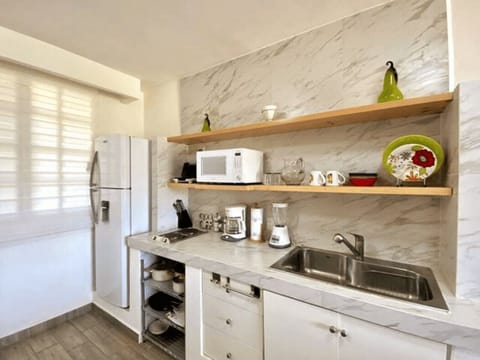 Apartment | Private kitchen | Full-size fridge, microwave, blender, griddle