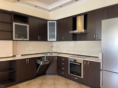 Apartment | Private kitchen | Full-size fridge, microwave, stovetop, electric kettle