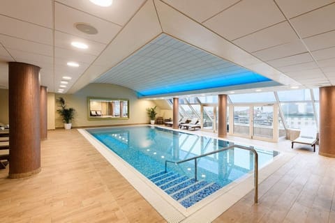 Indoor pool, open 9:00 AM to 9:00 PM, sun loungers