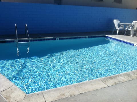 Outdoor pool, open 8:00 AM to 7:00 PM, sun loungers