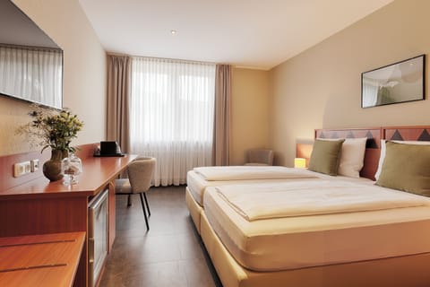 Standard Double Room | In-room safe, laptop workspace, blackout drapes, iron/ironing board