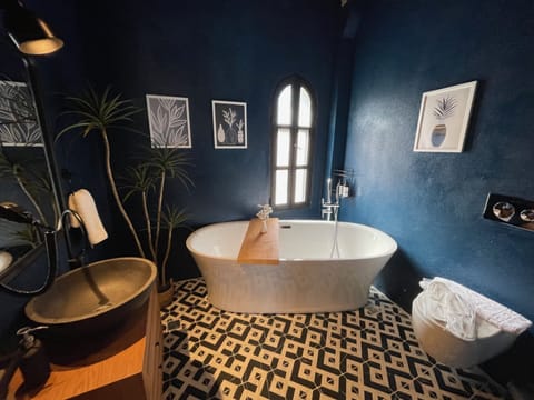 Exlusive Bathtub Room | Bathroom | Deep soaking tub, rainfall showerhead, free toiletries, hair dryer