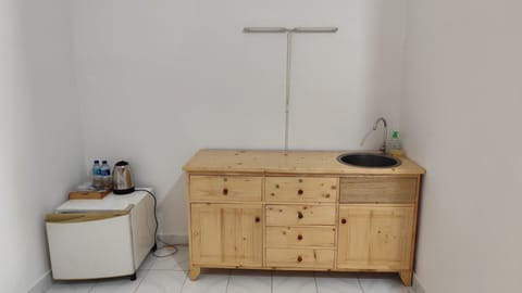 Standard Twin Room | Private kitchen | Fridge, electric kettle