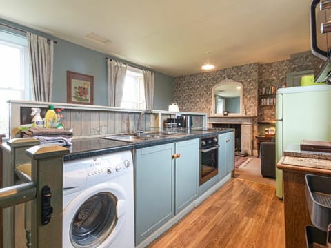 Fridge, electric kettle, cookware/dishes/utensils